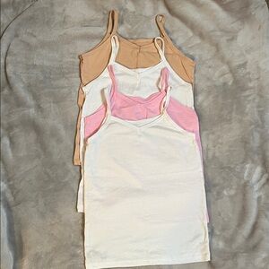 Set of Four Camisoles in 2 White, Pink, and Tan. New never worn.